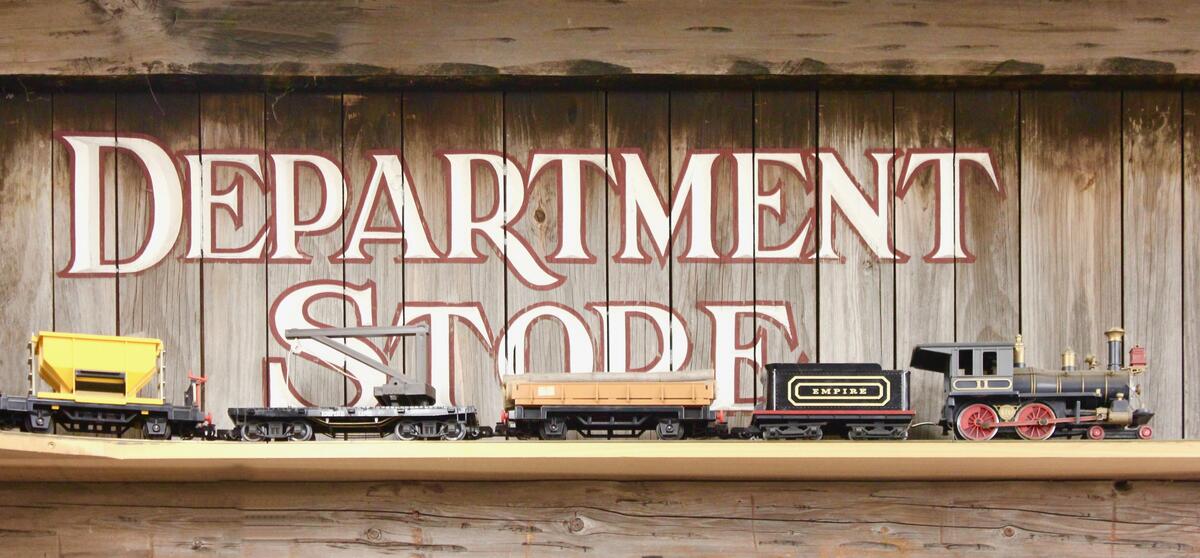 Department Store sign with model train